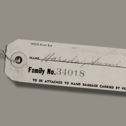 Luggage tag, Name: Sumi Harada, Family number 34018. To be attached to hand baggage carried by person.