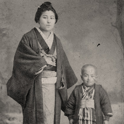 A young Ken Harada with her toddler son Masa Atsu, both dressed in traditional Japanese clothing.